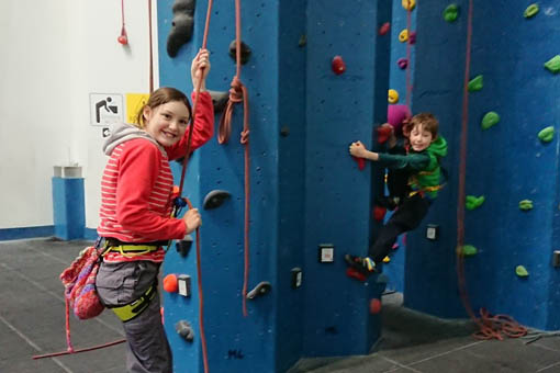 A small image of two children climbing
