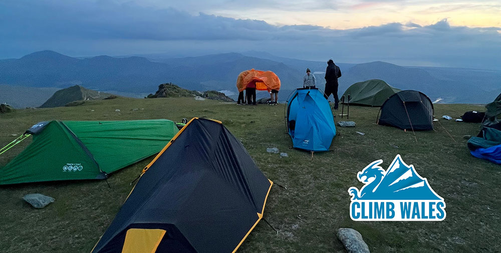 Camping on Snowdon Summit - A group of tents and an emergency shelter