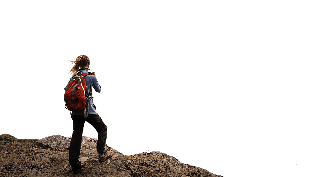 A Female Rock Climber/Mountaineer looking over towards Snowdon