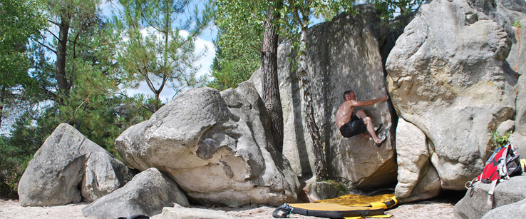 A climber on the boulders of Fontainbleau