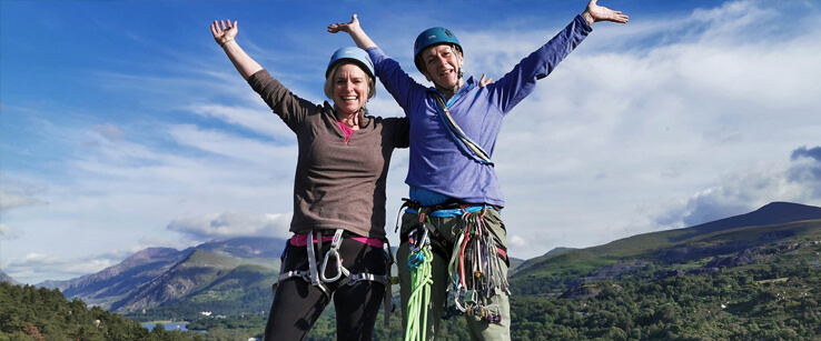 Two climbers celebrating after a two-day climbing course